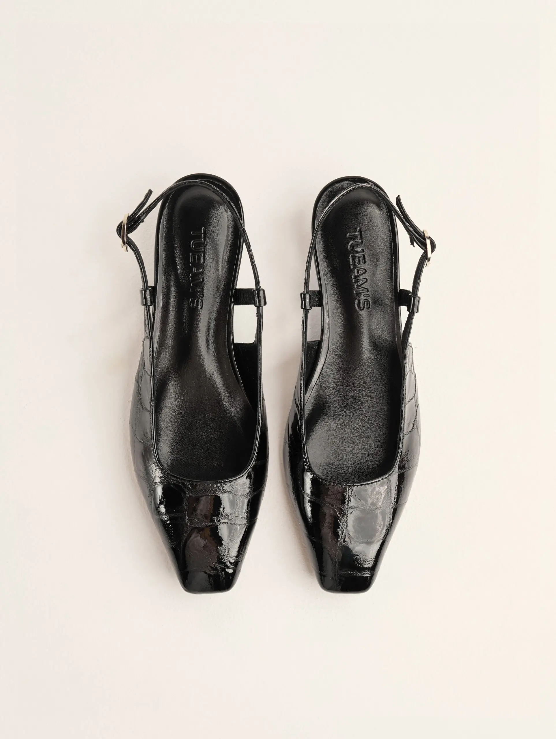 Slingback Selley in black textured leather